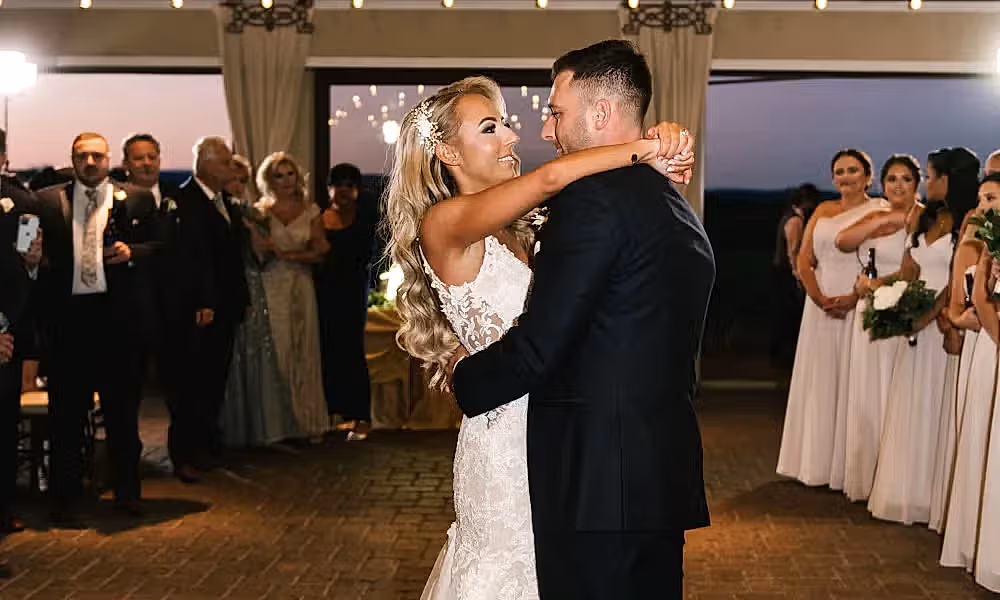 Bride and groom dance during their Ballyowen Bailigh Bluff House wedding reception.