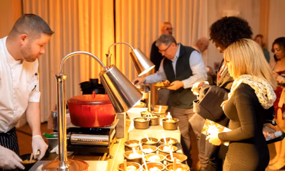 Chef's serving food in Diamond Cocktail Room. 