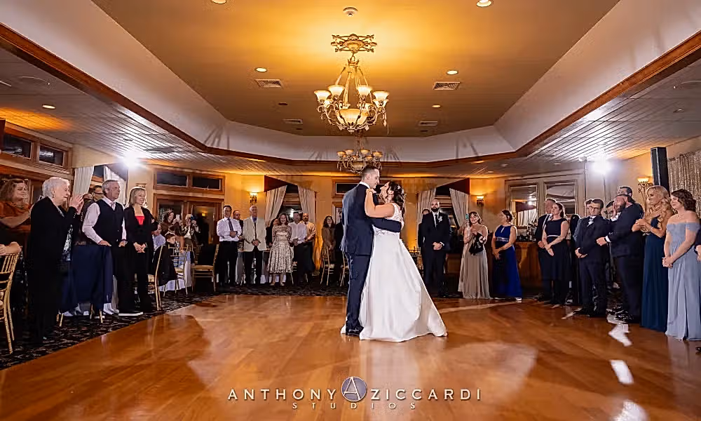 Bride and groom dance together during Black Bear wedding reception.