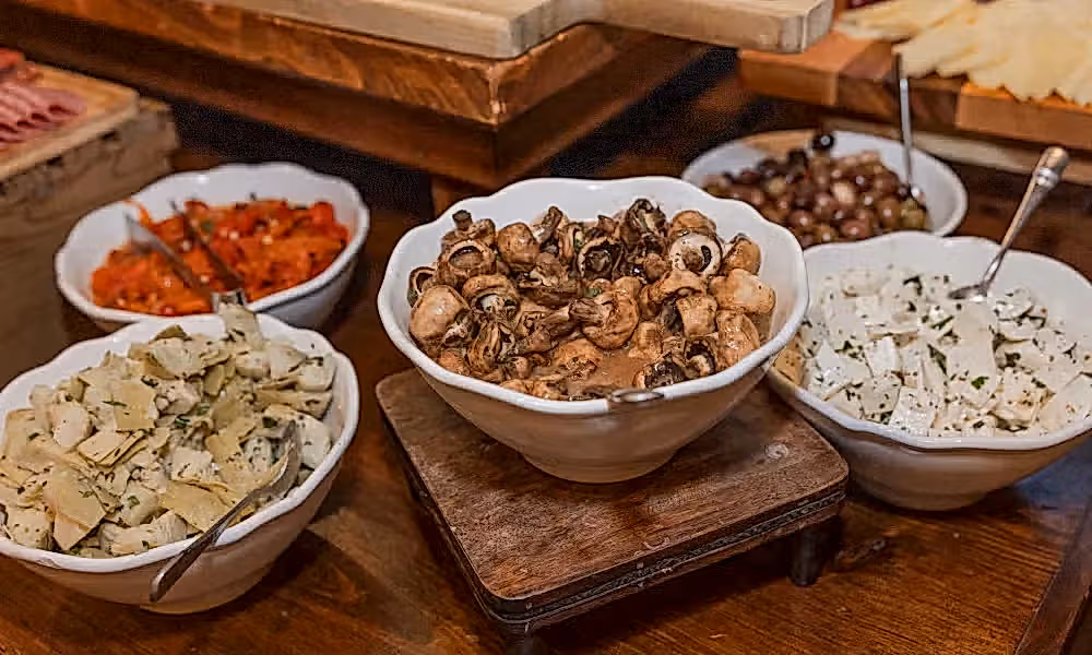 Mushrooms and chicken in a bowl.