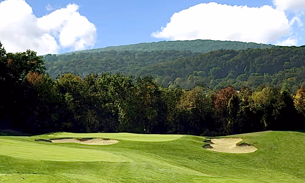 A view of the mountains from the fairway at Minerals Golf Club at Crystal Springs Resort