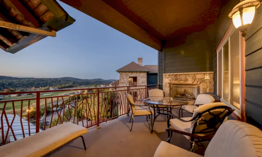 Hotel room balcony overlooking Fire and Water Terrace at Grand Cascades Lodge