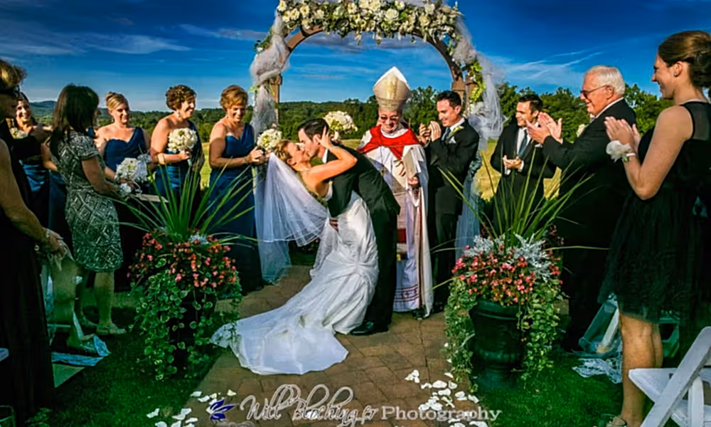 Bride and groom kiss after getting married