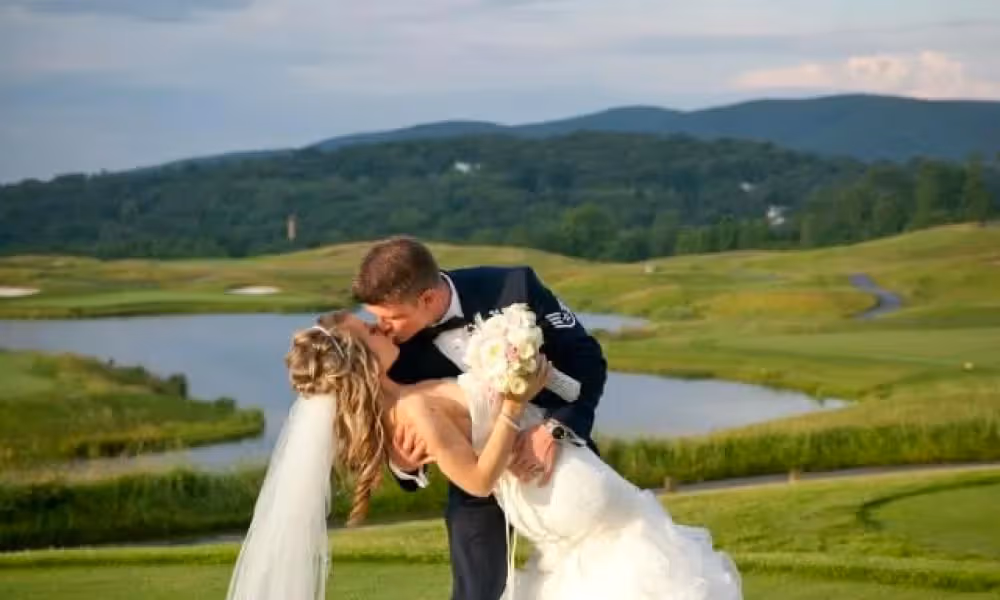 Bride and groom kissing at Crystal Springs Golf Resort