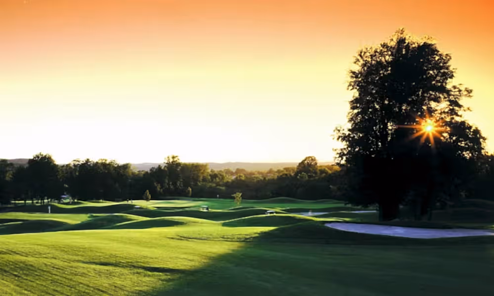 A sunset over the golf course at Black Bear at Crystal Springs Resort