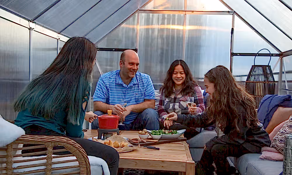 Family of four eating in Champagne Chalet