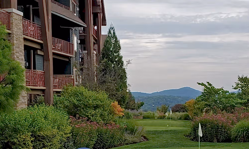 Dad Teaching Son to Golf on Practice Putting Course at Crystal Springs Resort
