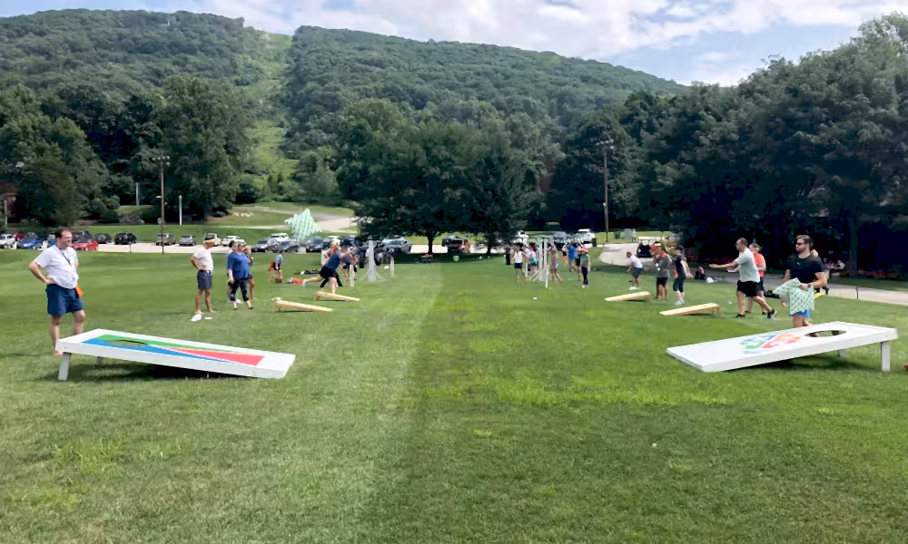 Giant corn hole corporate teambuilding activity at Crystal Springs Resort