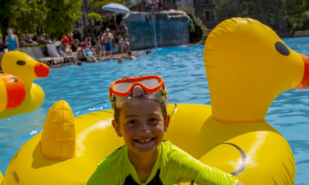 Child in duck floaty at Minerals Pool
