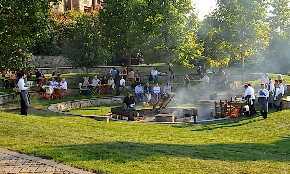 A large group BBQ in the Ampitheater at Grand Cascades Lodge at Crystal Springs Resort