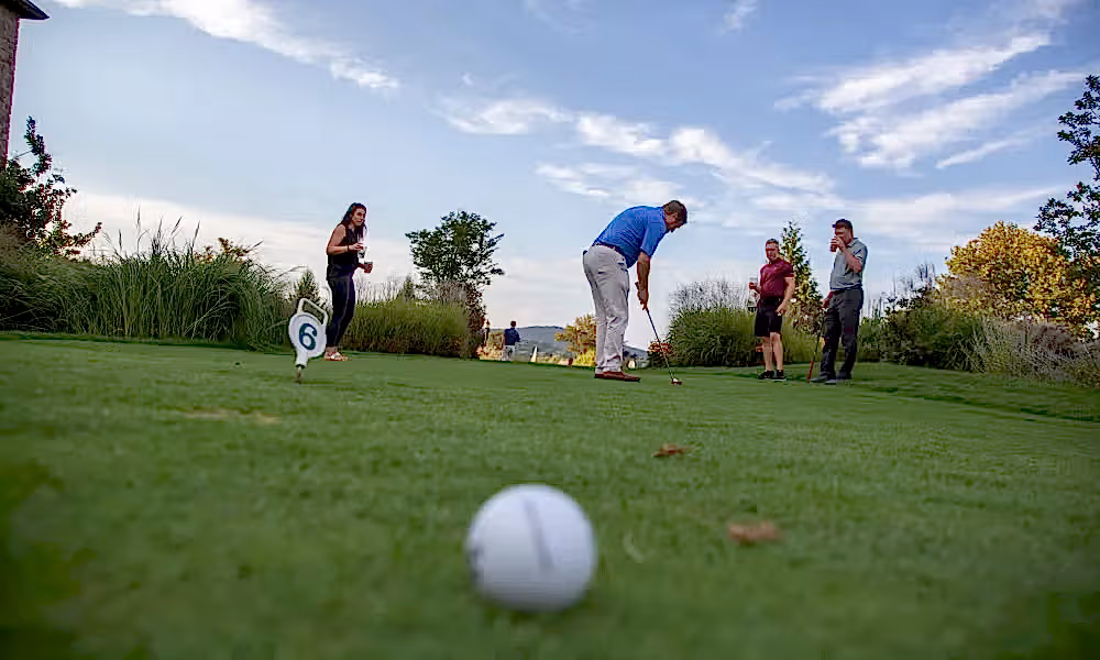 Group Playing Mini Golf at a resort close to NYC