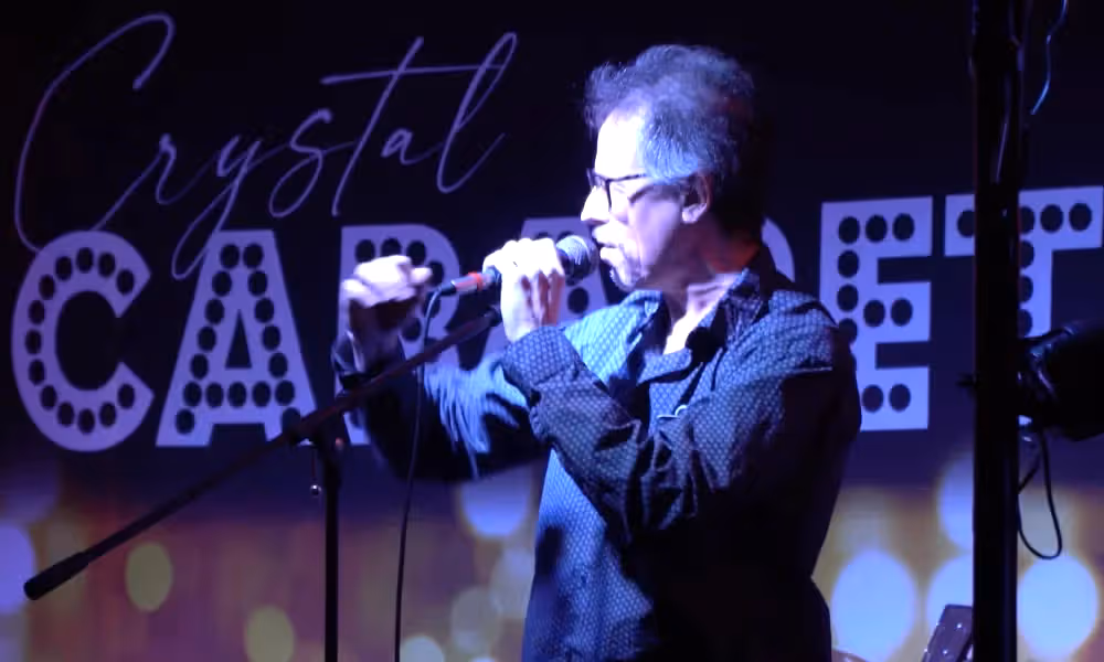 Man on microphone.