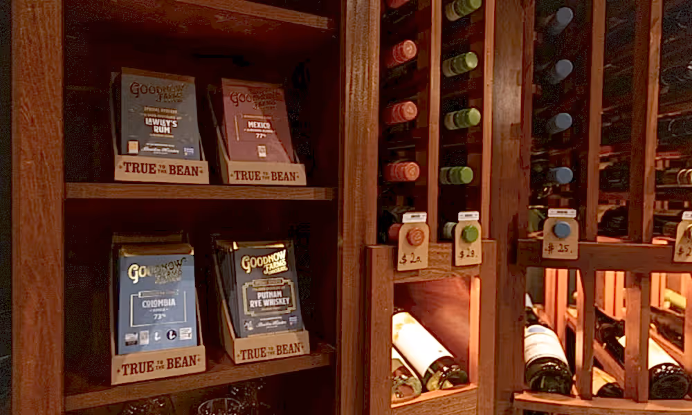Wine books and bottle racks at The Curator