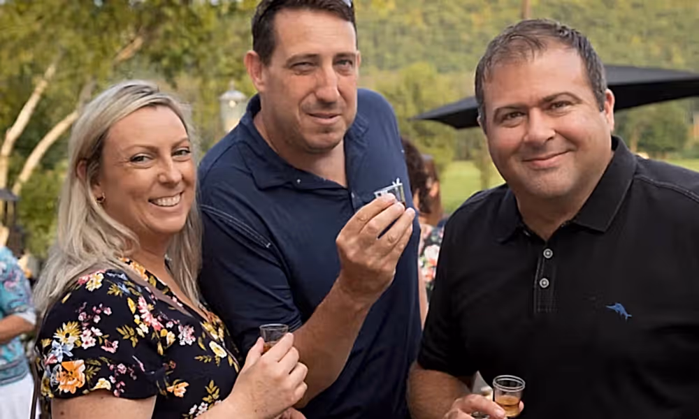 Friends doing shots of Bourbon
