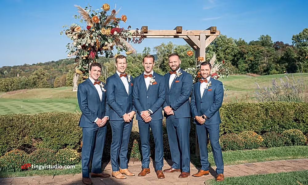 Groomsmen standing in front of alter at a golf course venue