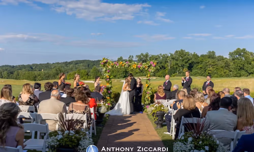 Couple kissing at wedding ceremony