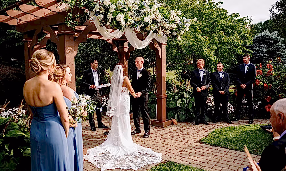 Bride and Groom at alter in Minerals Wedding garden