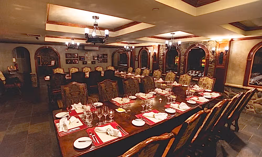U shaped table set up in the Wine Cellar.