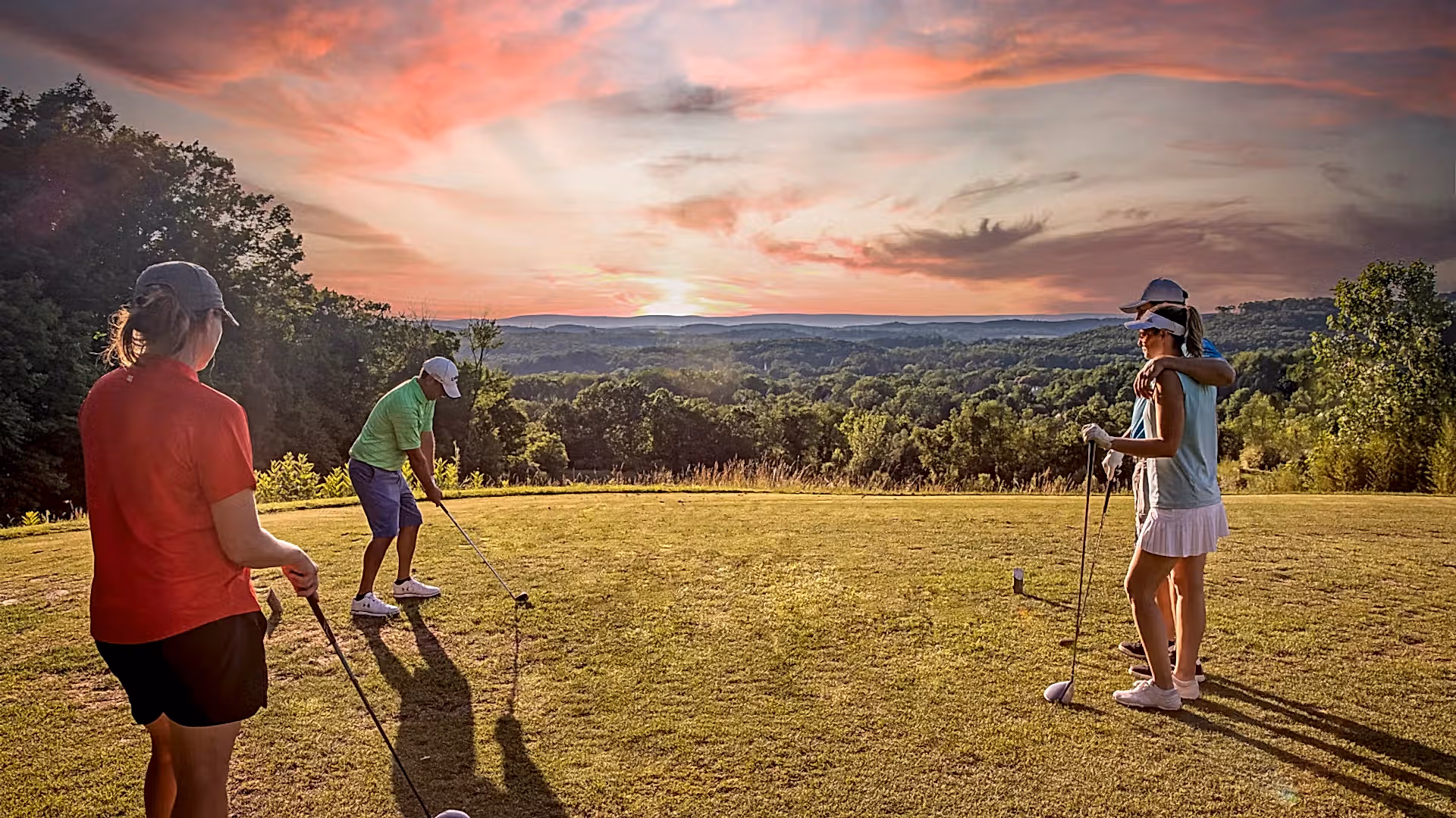Golfers at sunset on Wild Turkey Golf Club