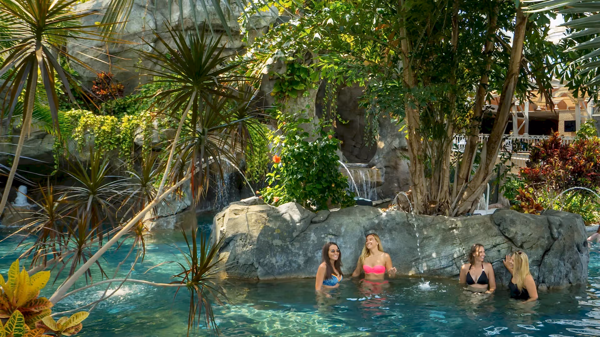 Girlfriends enjoying tropical atmosphere at Biosphere Indoor Pool Complex