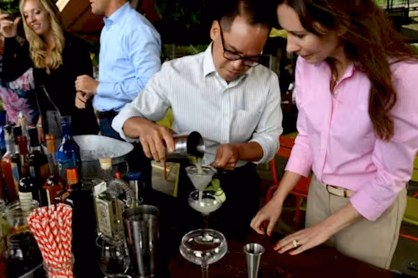 Adults participating in a Mixology teambuilding competition