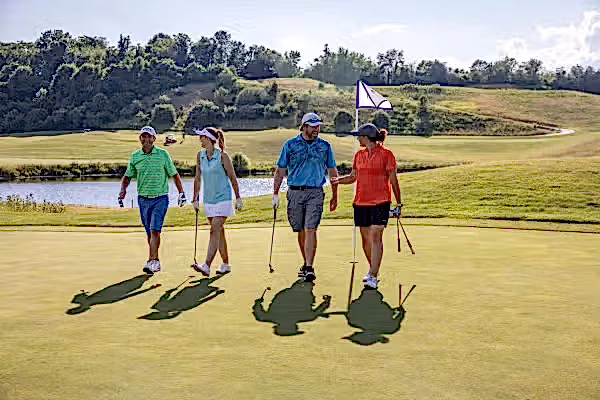 A foursome on the course of Wild Turkey at Crystal Springs Resort