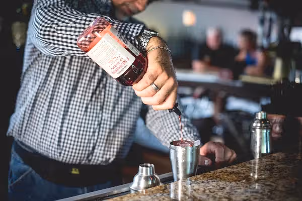 Bartender making a cocktail at Kites Restaurant