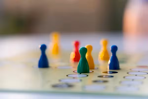 Colorful board game pieces.