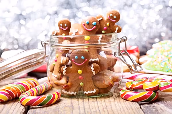 Decorated gingerbread cookes in a jar.