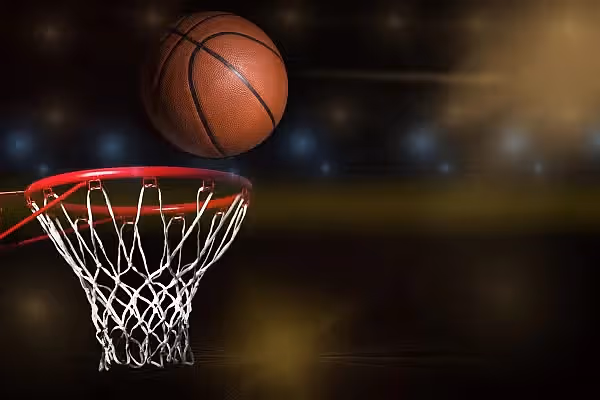 Basketball going into hoop.