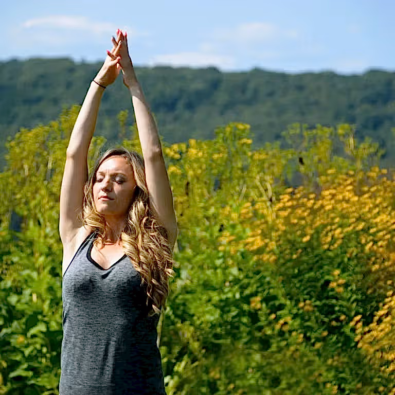 Woman doing Yoga Pose Outdoors