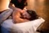 Woman getting her back massaged.