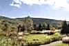 Fall mountains behind Grand Cascades Lodge.