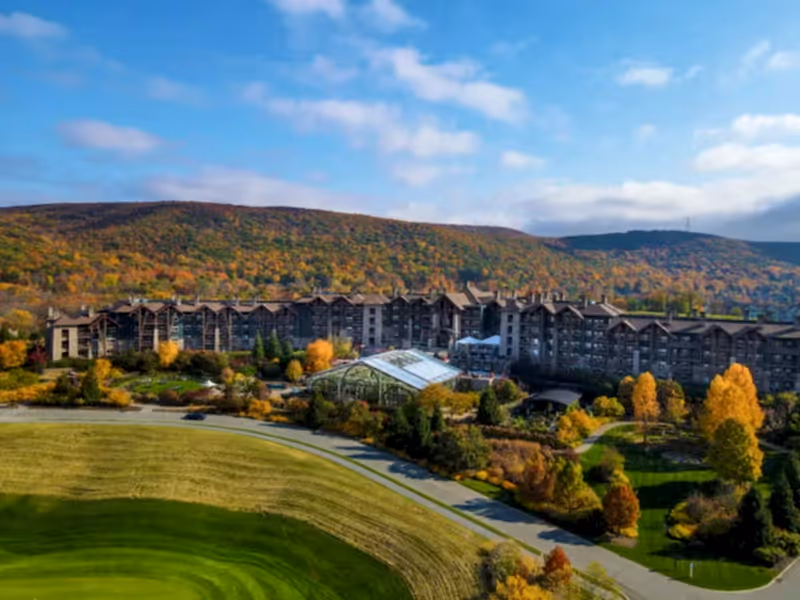 Grand Cascades Lodge exterior during fall.