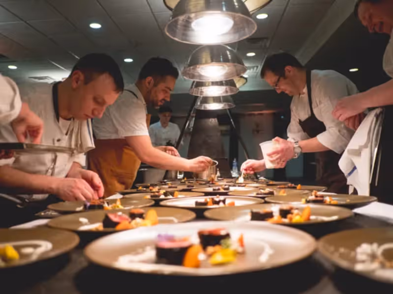 Chefs hard at work plating food at NJ Wine and Food Festival