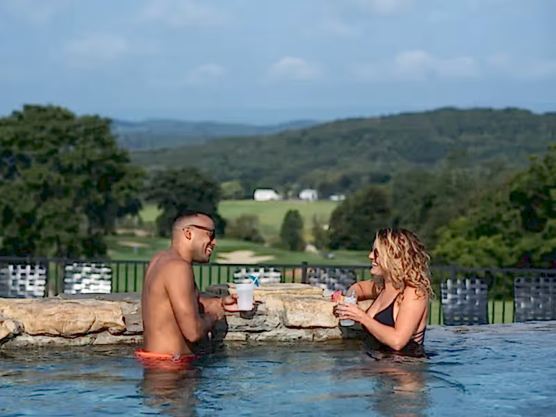 Couple in Vista 180 pool.