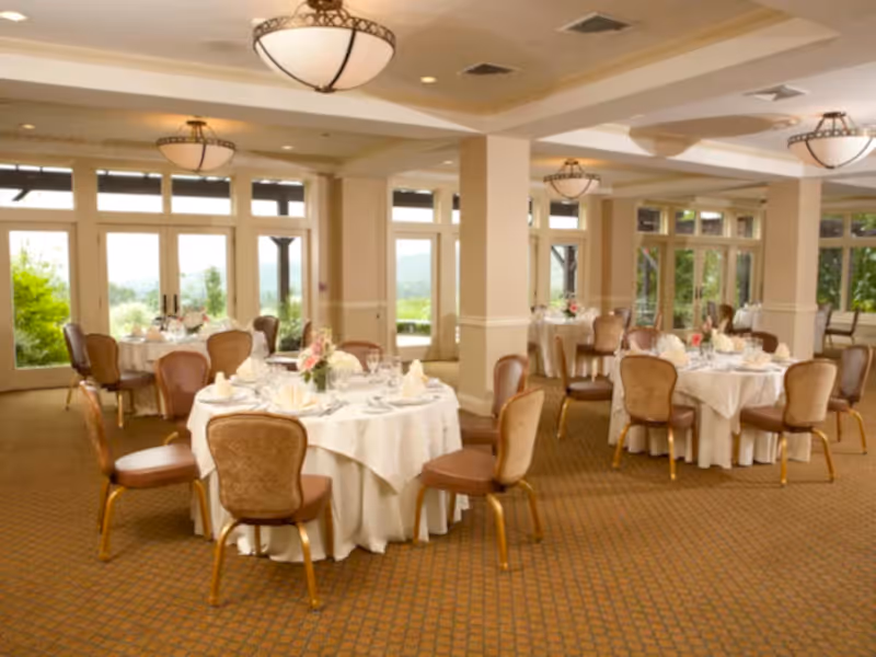 The Garden Room set up for a corporate dinner meeting