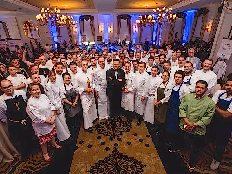 Robby Younes stands with chefs from all over the world at the NJ Wine and Food Festival.